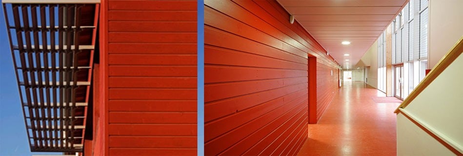Auvent à lames sur le bardage bois rouge, et couloir intérieur rouge largement vitré sur l'extérieur