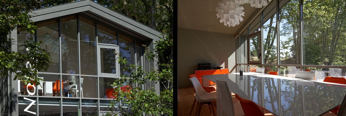 Pignon vitré de l'office marqué Notaire parmi les arbres, et salle de réunion à la table blanche et chaises rouges sous une suspension design, ouverte sur le bois
