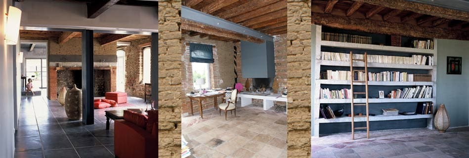Séjour aux murs de brique apparente avec bibliothèque intégrée et mobilier contemporain